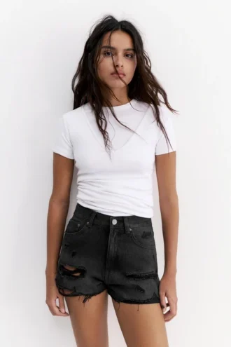 Pantalones Cortos vaqueros rasgados