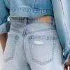 Pantalones Cortos vaqueros rasgados