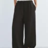 Pantalones de chándal de pierna ancha con bajo ajustable
