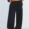 Pantalones de chándal de pierna ancha con bajo ajustable Pantalones de chándal de pierna ancha con bajo ajustable