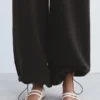 Pantalones de chándal de pierna ancha con bajo ajustable