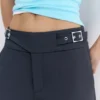 Pantalones de cintura ancha con hebilla Pantalones de cintura ancha con hebilla