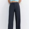 Pantalones de cintura ancha con hebilla Pantalones de cintura ancha con hebilla