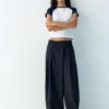 Pantalones elegantes con cintura cruzada Pantalones elegantes con cintura cruzada