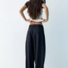 Pantalones elegantes con cintura cruzada Pantalones elegantes con cintura cruzada