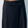 Pantalones elegantes con cintura cruzada Pantalones elegantes con cintura cruzada