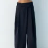 Pantalones elegantes con cintura cruzada Pantalones elegantes con cintura cruzada