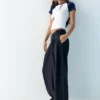 Pantalones elegantes con cintura cruzada Pantalones elegantes con cintura cruzada