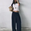 Pantalones elegantes con cintura cruzada Pantalones elegantes con cintura cruzada