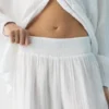 Pantalones fluidos con efecto gasa Pantalones fluidos con efecto gasa