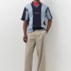 Polos de punto a rayas bordados Polos de punto a rayas bordados