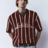 Polos de punto a rayas con cremallera Polos de punto a rayas con cremallera