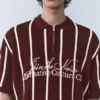 Polos de punto a rayas con cremallera Polos de punto a rayas con cremallera