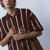 Polos de punto a rayas con cremallera Polos de punto a rayas con cremallera