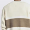 Polos de punto de manga larga con detalle de texto Polos de punto de manga larga con detalle de texto