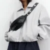 Riñonera con tachuelas Riñonera con tachuelas