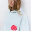 Sudadera con capucha y estampado floral Sudadera con capucha y estampado floral