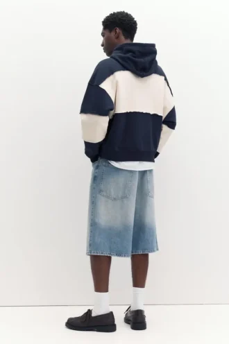 Sudadera con capucha y paneles STWD Studio