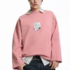 Sudadera rosa con etiqueta Sudadera rosa con etiqueta