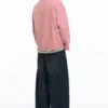 Sudadera rosa con etiqueta Sudadera rosa con etiqueta