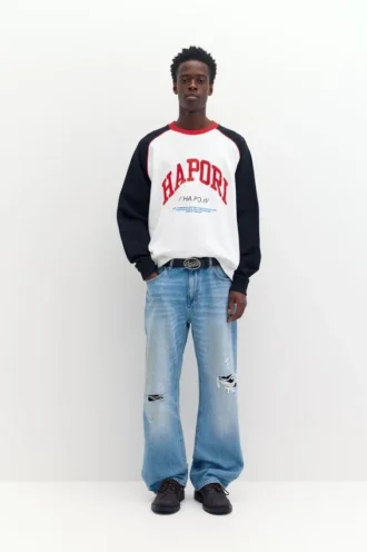 Vaqueros bootcut ajustados con rotos