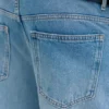 Vaqueros bootcut ajustados con rotos Vaqueros bootcut ajustados con rotos
