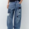 Vaqueros holgados con patchwork Vaqueros holgados con patchwork