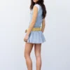 Vestido corto a cuadros con bajo voluminoso Vestido corto a cuadros con bajo voluminoso
