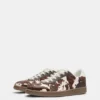 Zapatillas de piel con estampado de vaca